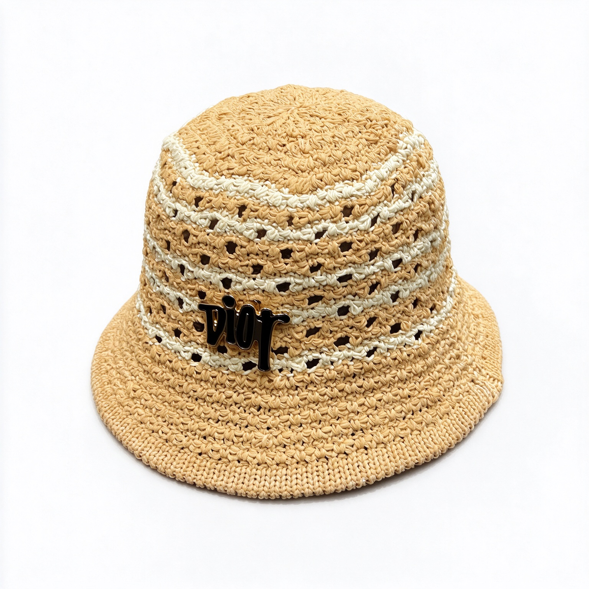 Dior-style crocheted raffia bucket hat—crafted from natural beige raffia in an open-weave pattern, featuring a black, metallic-finish Dior logo.