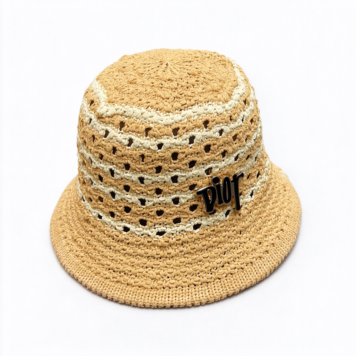 Dior-style crocheted raffia bucket hat—crafted from natural beige raffia in an open-weave pattern, featuring a black, metallic-finish Dior logo.