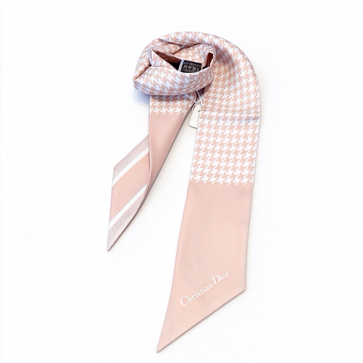 Dior-style Mitzah slim silk scarf—a long, pale pink houndstooth-patterned scarf; a luxury French designer-inspired accessory for women.