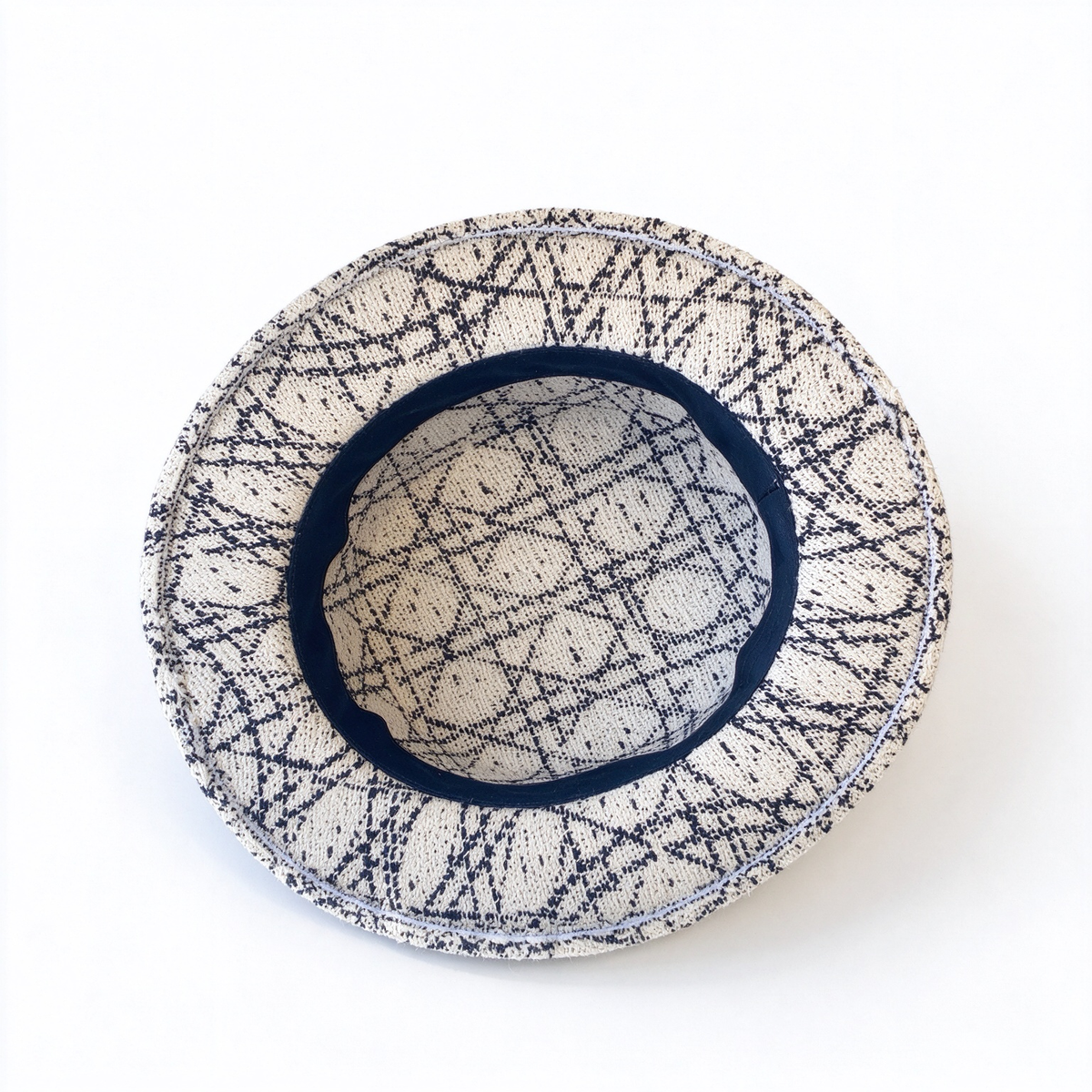 Dior Oblique Jacquard Bucket Hat — a navy blue and beige cotton-blend bucket hat, featuring a metal 'CD' buckle;